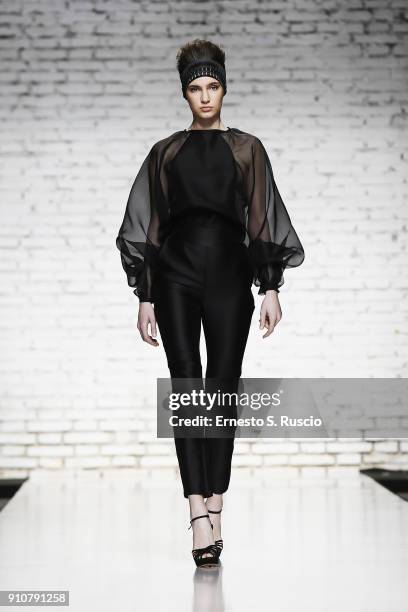 Model walks the runway at the Sabrina Persechino show during Altaroma on January 26, 2018 in Rome, Italy.