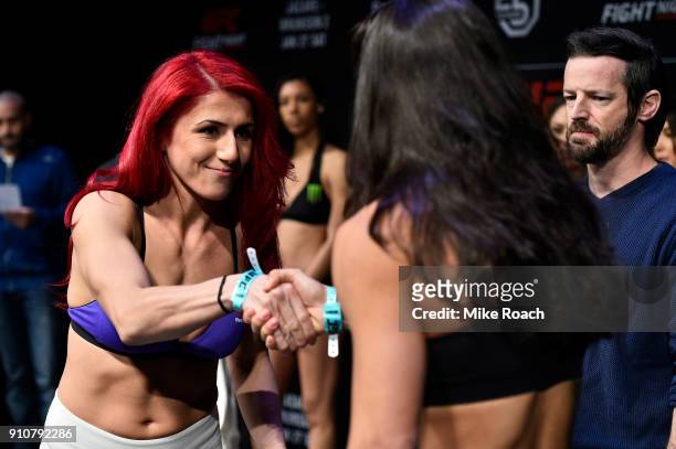 Randa Markos of Iraq and Juliana Lima shake hands during a UFC Fight Night weigh-in on January 26, 2018 in Charlotte, North Carolina.
