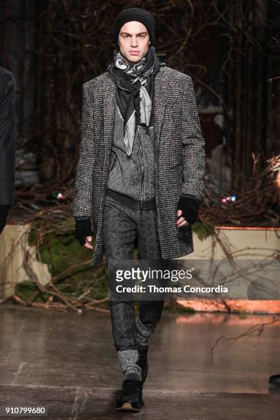 Jeremy walks the runway wearing John Varvatos Fall/Winter 2018 with makeup by Chika Chan for Make-Up Pro and Hair by Yannik D'Is for Cultler/Redken...