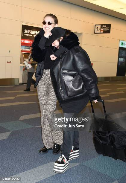 Gigi Hadid and makeup artist Erin Parsons are seen at Haneda Airport on January 27, 2018 in Tokyo, Japan.
