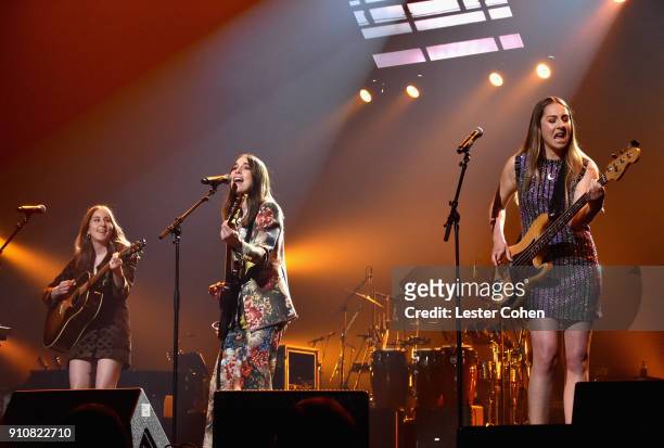 Musicians Alana Haim, Danielle Haim and Este Haim of Haim perform onstage at MusiCares Person of the Year honoring Fleetwood Mac at Radio City Music...