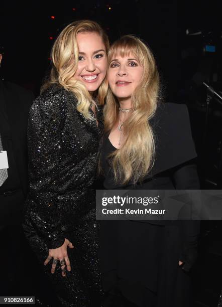 Musicians Miley Cyrus and honoree Stevie Nicks of Fleetwood Mac attend MusiCares Person of the Year honoring Fleetwood Mac at Radio City Music Hall...