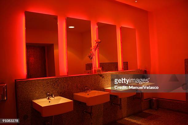 red restroom - manuel velasco stock pictures, royalty-free photos & images