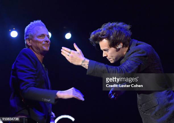 Honoree Lindsey Buckingham and musician Harry Styles perform onstage at MusiCares Person of the Year honoring Fleetwood Mac at Radio City Music Hall...