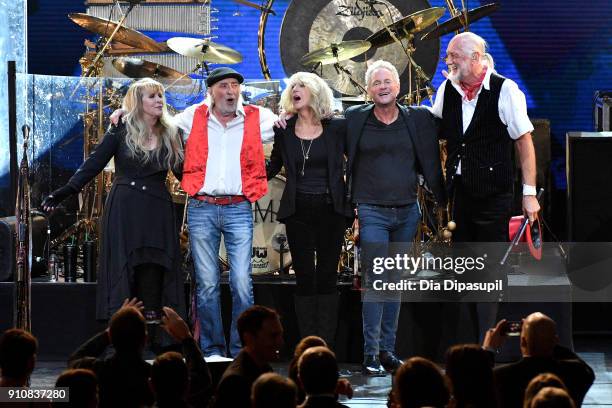 Honorees Stevie Nicks, John McVie, Christine McVie, Lindsey Buckingham and Mick Fleetwood of Fleetwood Mac take a bow onstage during MusiCares Person...