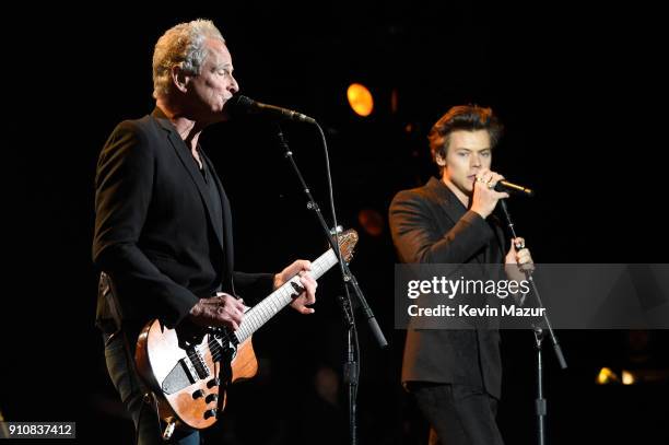 Musicians Lindsey Buckingham and Harry Styles perform onstage at MusiCares Person of the Year honoring Fleetwood Mac at Radio City Music Hall on...