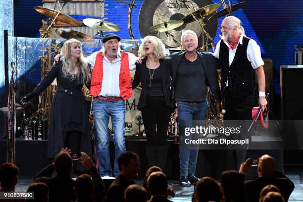 Honorees Stevie Nicks, John McVie, Christine McVie, Lindsey Buckingham and Mick Fleetwood perform onstage during MusiCares Person of the Year...