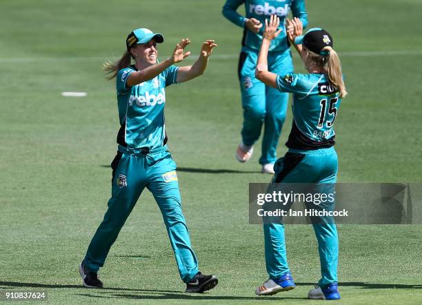 Kirby Short of the Heat celebrates with Jemma Barsby of the Heat after taking the catch to dismiss Nicola Carey of the Thunder during the Women's Big...