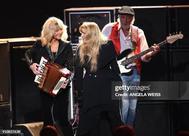 Christine McVie, Stevie Nicks and John McVie of Fleetwood Mac performs at the Person Of The Year gala at Radio City Music Hall in New York on January...