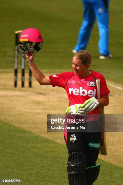 Alyssa Healy of the Sixers celebrates her century during the Women's Big Bash League match between the Adelaide Strikers and the Sydney Sixers at...