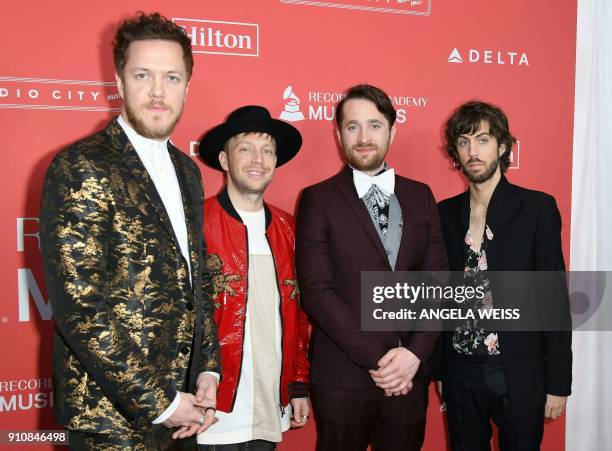 Dan Reynolds, Ben McKee, Daniel Platzman, and Wayne Sermon of the band Imagine Dragons arrives for the 2018 MusiCares Person Of The Year gala at...