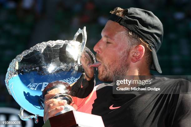 Dylan Alcott of Australia poses with the championship trophy after winning the Quad Wheelchair Singles Final against David Wagner of the United...