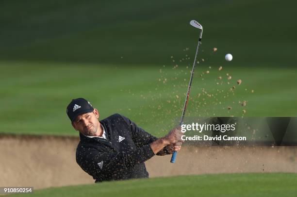 Sergio Garcia of Spain plays his third shot on the par 4, 14th hole during the completion of the second round of the Omega Dubai Desert Classic on...