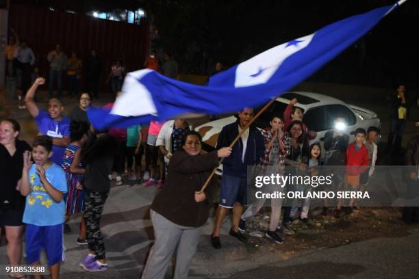 Supporters of defeated opposition presidential candidate Salvador Nasralla protest against the inauguration of the President Juan Orlando Hernandez...