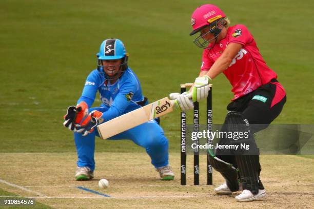 Alyssa Healy of the Sixers plays a cut shot during the Women's Big Bash League match between the Adelaide Strikers and the Sydney Sixers at...