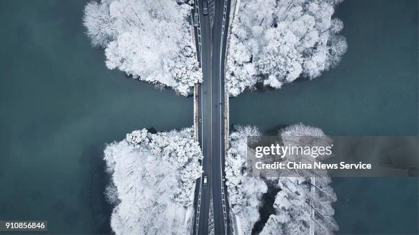 Aerial view of the West Lake after a heavy snowfall on January 26, 2018 in Hangzhou, Zhejiang Province of China.