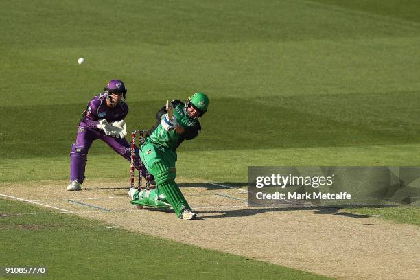 Ben Dunk of the Stars hits a six during the Big Bash League match between the Melbourne Stars and and the Hobart Hurricanes at Melbourne Cricket...