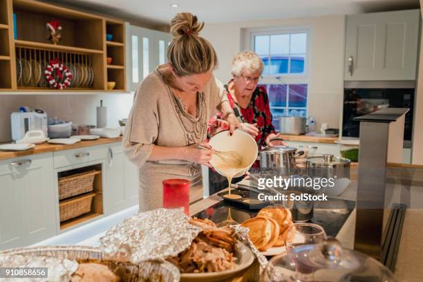 cooking christmas dinner - christmas preparation stock pictures, royalty-free photos & images