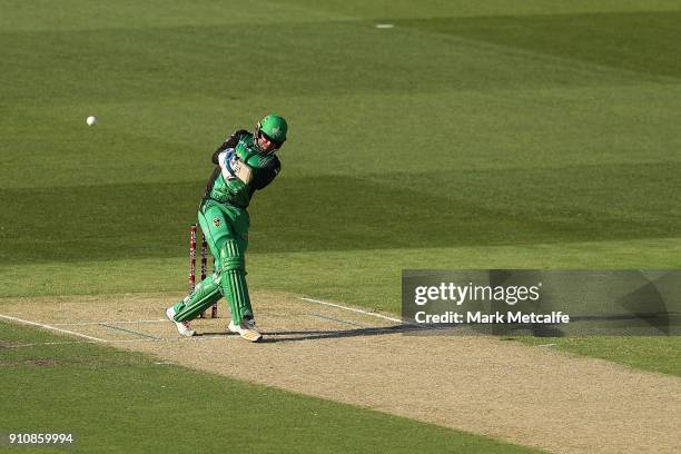 Ben Dunk of the Stars hits a six during the Big Bash League match between the Melbourne Stars and and the Hobart Hurricanes at Melbourne Cricket...