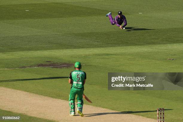 Nathan Reardon of the Hurricanes drops James Faulkner of the Stars during the Big Bash League match between the Melbourne Stars and and the Hobart...