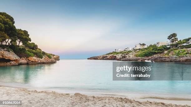 mallorca beach sunset - mittelmeer stock-fotos und bilder