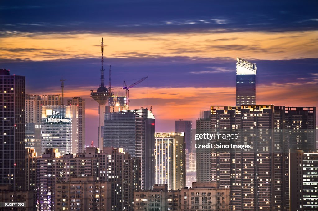 Illuminated modern skyscrapers at dusk, Shenyang, Liaoning, China
