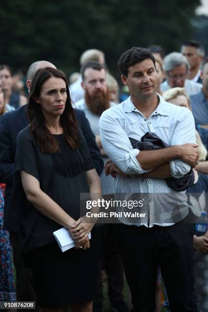 Prime Minister Jacinda Ardern and her partner Clarke Gayford look on at Little Shoal Bay during the official launch party on January 27, 2018 in...