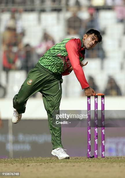 Bangladesh cricketer Mehedi Hasan Miraz bowls during the final one day international cricket match in the Tri-Nations Series between Sri Lanka and...