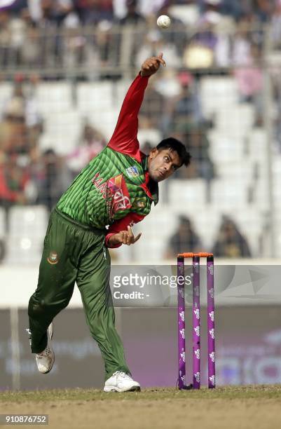 Bangladesh cricketer Mehedi Hasan Miraz bowls during the final one day international cricket match in the Tri-Nations Series between Sri Lanka and...