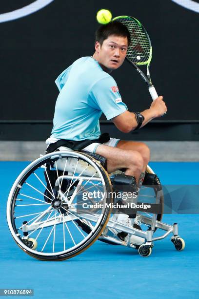 Shingo Kunieda of Japan plays a backhand in his men's wheelchair singles final against Stephane Houdet of France during the Australian Open 2018...