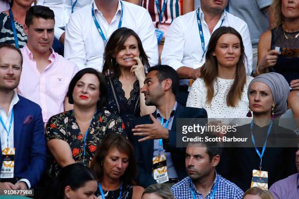The Projects hosts Lisa Wilkinson and Waleed Aly and Aly's wife Susan Carland watch the women's singles final between Caroline Wozniacki of Denmark...