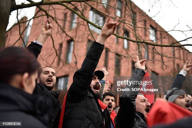 Turkish nationalists show the wolf salute during a counter-demonstration. Several hundred Kurds demonstrate in front of the Turkish embassy against...