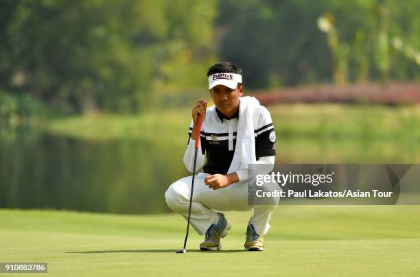 Suradit Yongcharoenchai of Thailand plays a shot during round three of the Leopalace21 Myanmar Open at Pun Hlaing Golf Club on January 27, 2018 in...