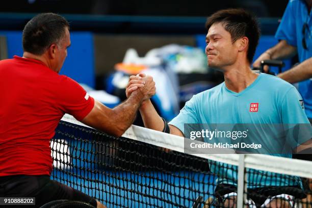 Stephane Houdet of France congratulates Shingo Kunieda of Japan after Kunieda won their Men's Wheelchair Singles Final against during the Australian...