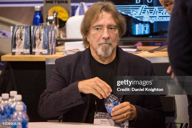 Bassist Geezer Butler of Black Sabbath signs autographs at The 2018 NAMM Show at Anaheim Convention Center on January 26, 2018 in Anaheim, California.