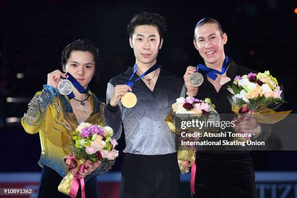Shoma Uno of Japan , Boyang Jin of China and Jason Brown of the USA pose with thier medals during day four of the Four Continents Figure Skating...