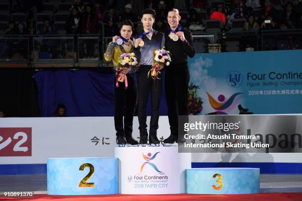 Shoma Uno of Japan , Boyang Jin of China and Jason Brown of the USA pose on the podium during day four of the Four Continents Figure Skating...