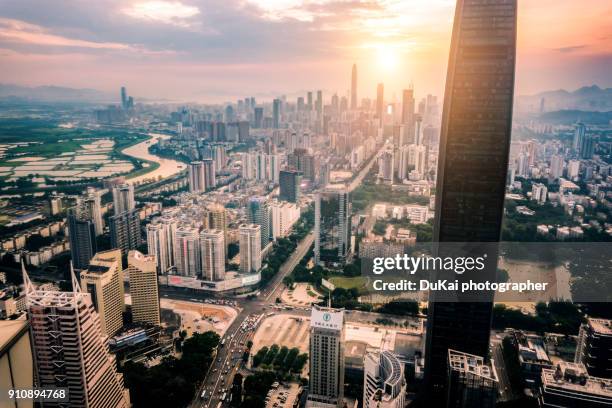 elevated view of shenzhen skyline - strength tester stock pictures, royalty-free photos & images