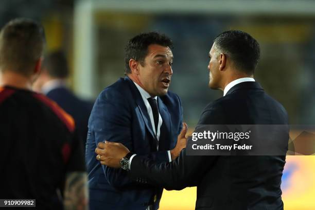 Paul Okon of the Mariners and John Aloisi of the Roar in discussion after the game during the round 18 A-League match between the Central Coast...