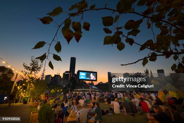 General view of crowds at AO Festival of tennis live site at Birrarung Marr watching women's singles final match between Romania's Simona Halep and...