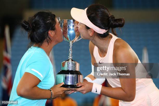 En Shuo Liang of Taipei and Xinyu Wang of China pose for a photo with the championship trophy after winning the Junior Girls' Doubles Final at the...