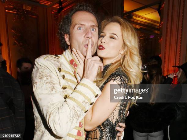 Nicolas Mereau and Julie Jardon attend the "The Couture Ball" Le Jean Paul Benielli Show Party at Le Mona Bismarck on January 26, 2018 in Paris,...