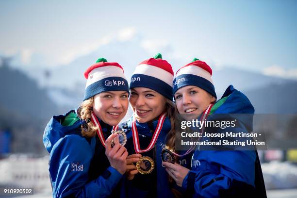 Joy Beune, Jutta Leerdam and Elisa Dul of Netherlands pose in the Ladies 1000m medal ceremony during the ISU Junior World Cup Speed Skating at...