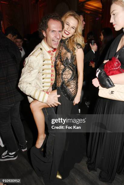 Nicolas Mereau and Julie Jardon attend the "The Couture Ball" Le Jean Paul Benielli Show Party at Le Mona Bismarck on January 26, 2018 in Paris,...