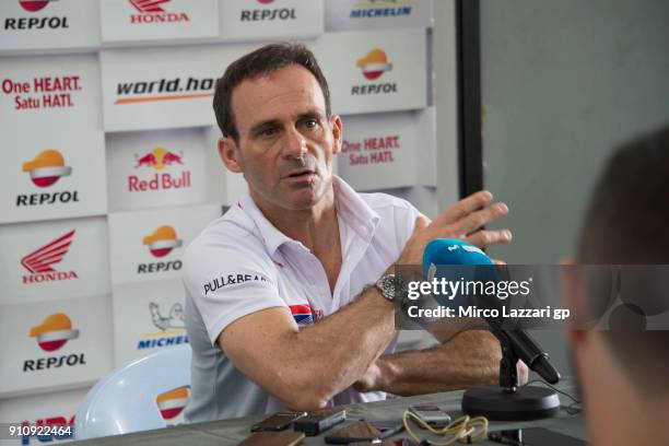 Alberto Puig of Spain and Repsol Honda Team speaks with journalists at Sepang Circuit on January 27, 2018 in Kuala Lumpur, Malaysia.