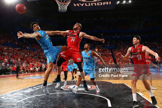 Shea Ili of the Breakers and Jesse Wagstaff of the Wildcats contest a rebound during the round 16 NBL match between the Perth Wildcats and the New...