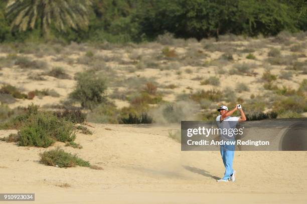 Pat Perez of the United States plays his second shot on the 8th hole during day three of Omega Dubai Desert Classic at Emirates Golf Club on January...