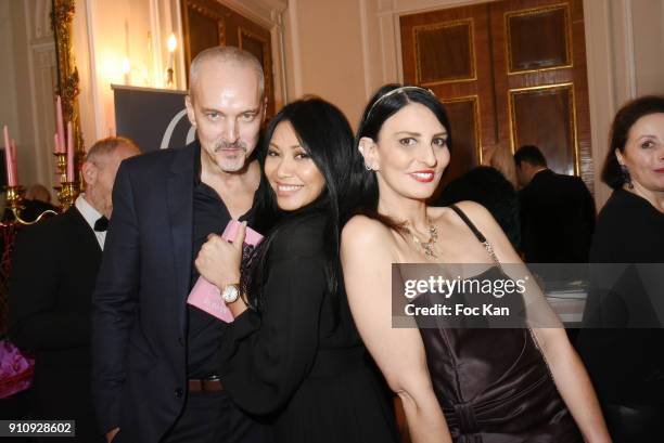 Christian Kretschmar, Anggun and Sylvie Ortega Munos attend the "The Couture Ball" Le Jean Paul Benielli Show Party at Le Mona Bismarck on January...