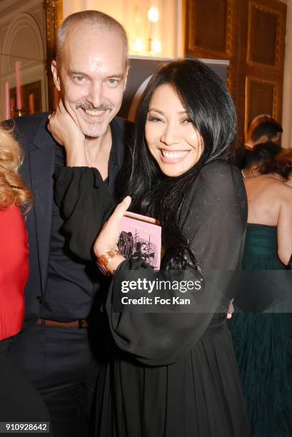 Christian Kretschmar and Anggun attend the "The Couture Ball" Le Jean Paul Benielli Show Party at Le Mona Bismarck on January 26, 2018 in Paris,...