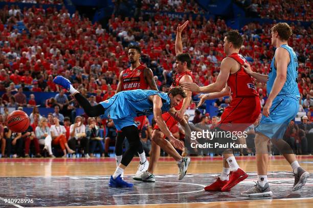 Thomas Abercrombie of the Breakers gets fouled by Damian Martin of the Wildcats during the round 16 NBL match between the Perth Wildcats and the New...